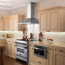 ZLINE 48 in. CrownSound™ Ducted Vent Wall Mount Range Hood in Stainless Steel with Built-in Bluetooth Speakers (KL2CRN-BT-48) in a farmhouse-style kitchen.