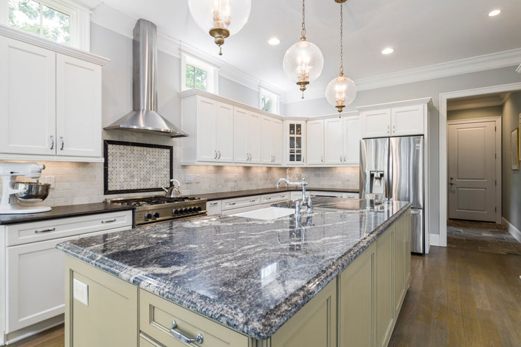 Kitchen island with a natural granite countertop