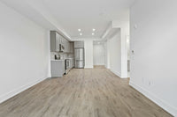 Mango luxury vinyl flooring through an open-plan apartment