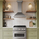 ZLINE 30 in. Convertible Vent Wall Mount Range Hood in Stainless Steel with Crown Molding (KBCRN-30) in a luxury kitchen.