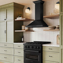 ZLINE 30 in. Convertible Vent Wall Mount Range Hood in Black Stainless Steel with Crown Molding (BSKBNCRN-30) in a luxury kitchen.