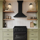 ZLINE 36 in. Convertible Vent Wall Mount Range Hood in Black Stainless Steel with Crown Molding (BSKBNCRN-36) in a luxury kitchen.