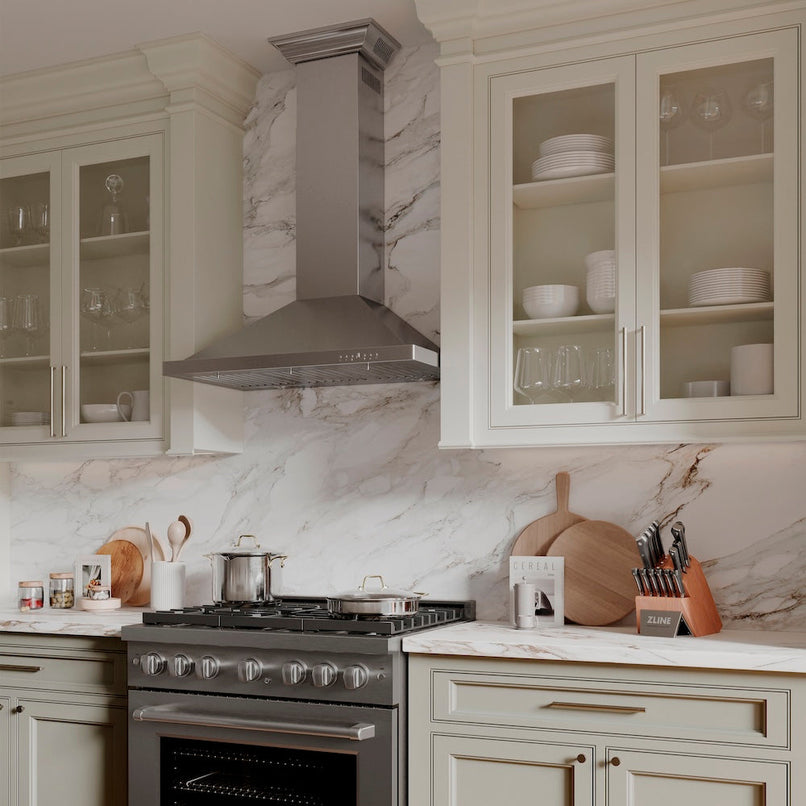 ZLINE 36 in. Convertible Vent Wall Mount Range Hood in Stainless Steel with Crown Molding (KBCRN-36) in a luxury kitchen.