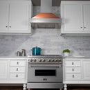 ZLINE 30 in. Ducted Satin Stainless Steel Wall Mount Range Hood with Copper Shell (8654C-30) in a luxury kitchen.