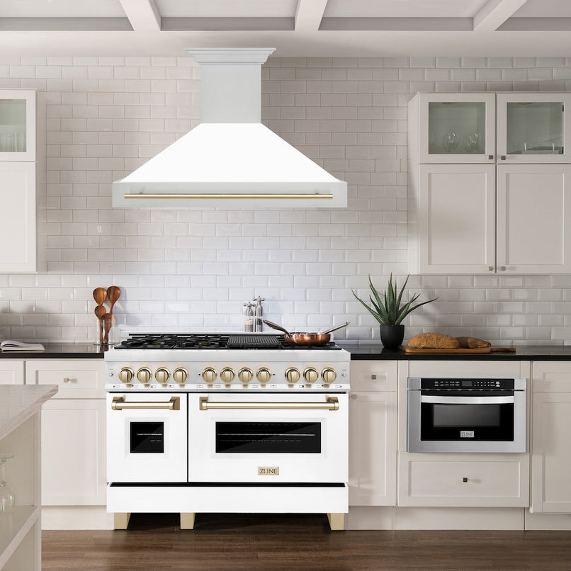 ZLINE Autograph Edition 48 in. Stainless Steel Range Hood with White Matte Shell and Polished Gold Handle (8654STZ-WM48-G) in a luxury kitchen.