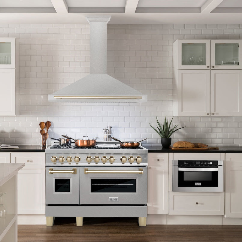 ZLINE Autograph Edition 48 in. Convertible Satin Stainless Steel Wall Mount Range Hood with Polished Gold Handle (KB4SNZ-48-G) in a luxury kitchen.