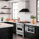 ZLINE 30 in. Satin Stainless Steel Wall Mount Range Hood with Black Matte Shell and Stainless Steel Handle (8654SNX-BLM-30) in a luxury kitchen.