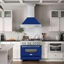 ZLINE 36 in. Satin Stainless Steel Wall Mount Range Hood with Blue Gloss Shell and Stainless Steel Handle (8654SNX-BG36) in a luxury kitchen.