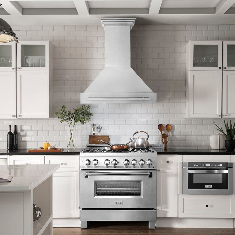 ZLINE 36 in. Satin Stainless Steel Wall Mount Range Hood with Stainless Steel Handle (8654SNX-36) in a luxury kitchen.