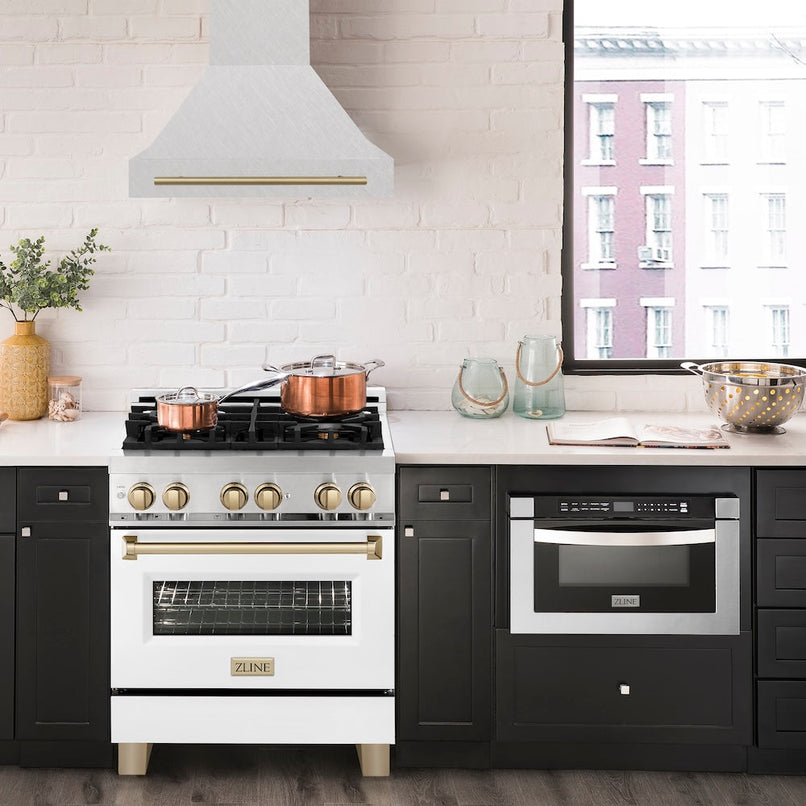 ZLINE Autograph Edition 30 in. Satin Stainless Steel Wall Mount Range Hood with Champagne Bronze Handle (8654SNZ-30-CB) in a luxury kitchen.