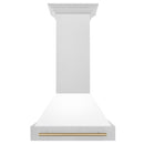 ZLINE Autograph Edition 30 in. Satin Stainless Steel Wall Mount Range Hood with White Matte Shell and Champagne Bronze Handle (8654SNZ-WM30-CB) front.