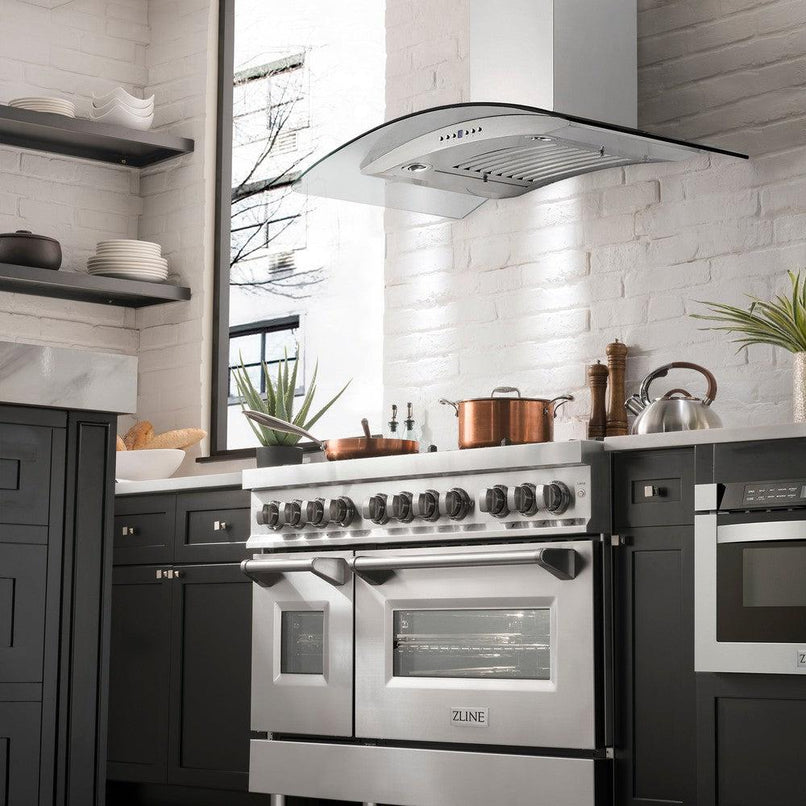 ZLINE 48 in. CrownSound™ Ducted Vent Wall Mount Range Hood in Stainless Steel with Built-in Bluetooth Speakers (KN4CRN-BT-48) in a luxury kitchen.