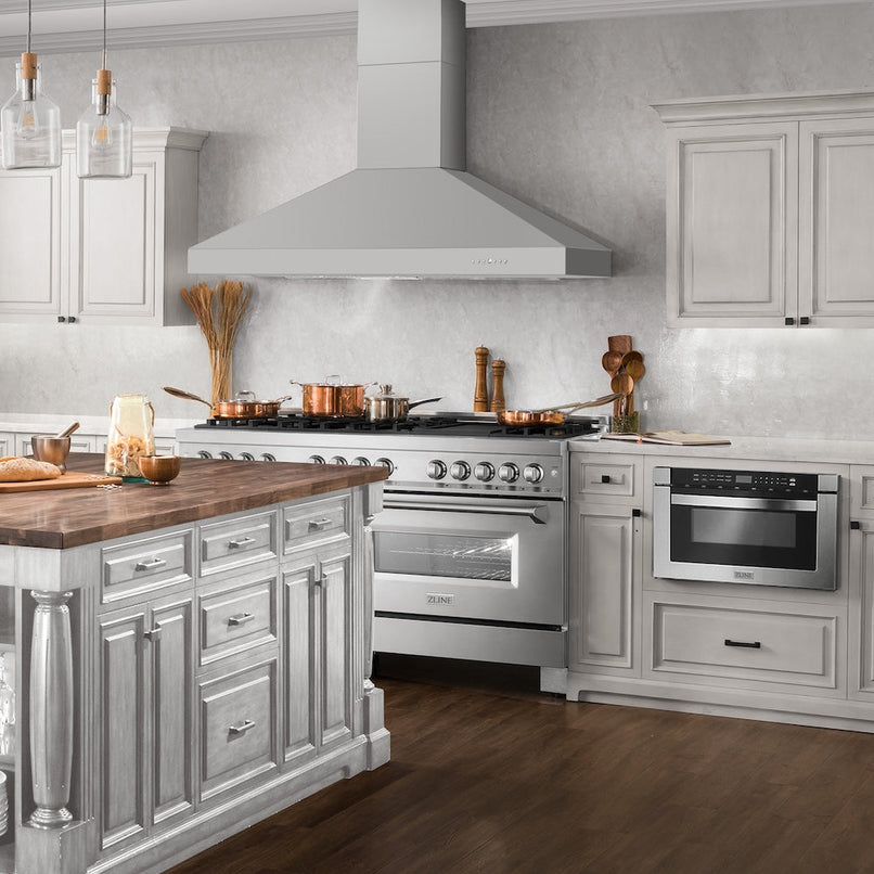 ZLINE 60 in. Professional Convertible Vent Wall Mount Range Hood in Stainless Steel (597-60) in a luxury kitchen.