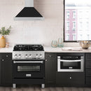 ZLINE 30 in. Convertible Satin Stainless Steel Wall Mount Range Hood with Black Matte Shell and Stainless Steel Handle (KB4SNX-BLM-30) in a luxury kitchen.