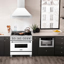 ZLINE 36 in. Satin Stainless Steel Wall Mount Range Hood with White Matte Shell and Stainless Steel Handle (8654SNX-WM-36) in a luxury kitchen.