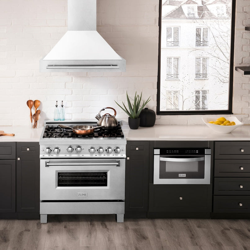 ZLINE 36 in. Satin Stainless Steel Wall Mount Range Hood with White Matte Shell and Stainless Steel Handle (8654SNX-WM-36) in a luxury kitchen.